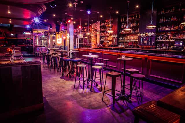 Semi-private bar space with stylish decor for cocktail receptions and networking events.