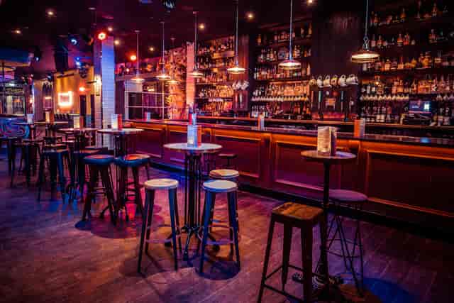Vibrant semi-private bar space for cocktail receptions and networking events.