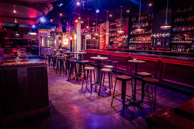 Stylish semi-private bar venue for intimate gatherings and networking events.
