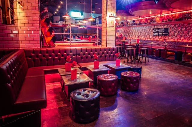 Vibrant event space with stylish seating, ideal for cocktail receptions and networking.