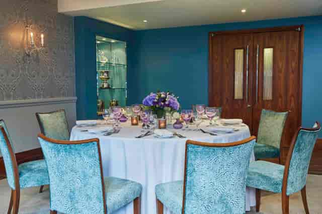 Eaton suite at The Capital Hotel: elegant round table for upscale meetings and events.