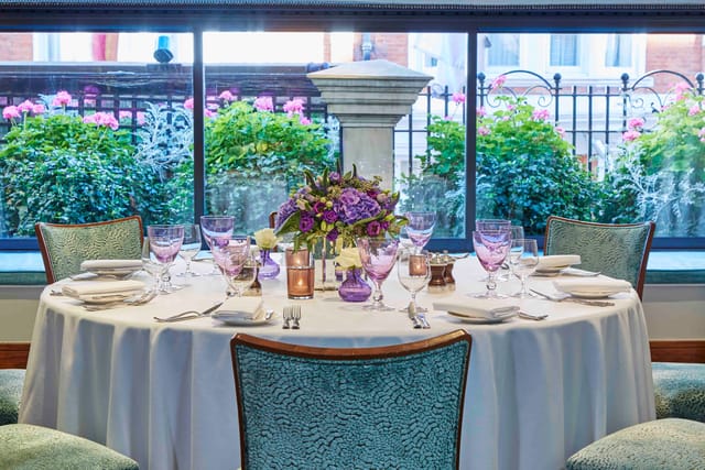 Eaton suite at The Capital Hotel: elegant round table for weddings and corporate events.