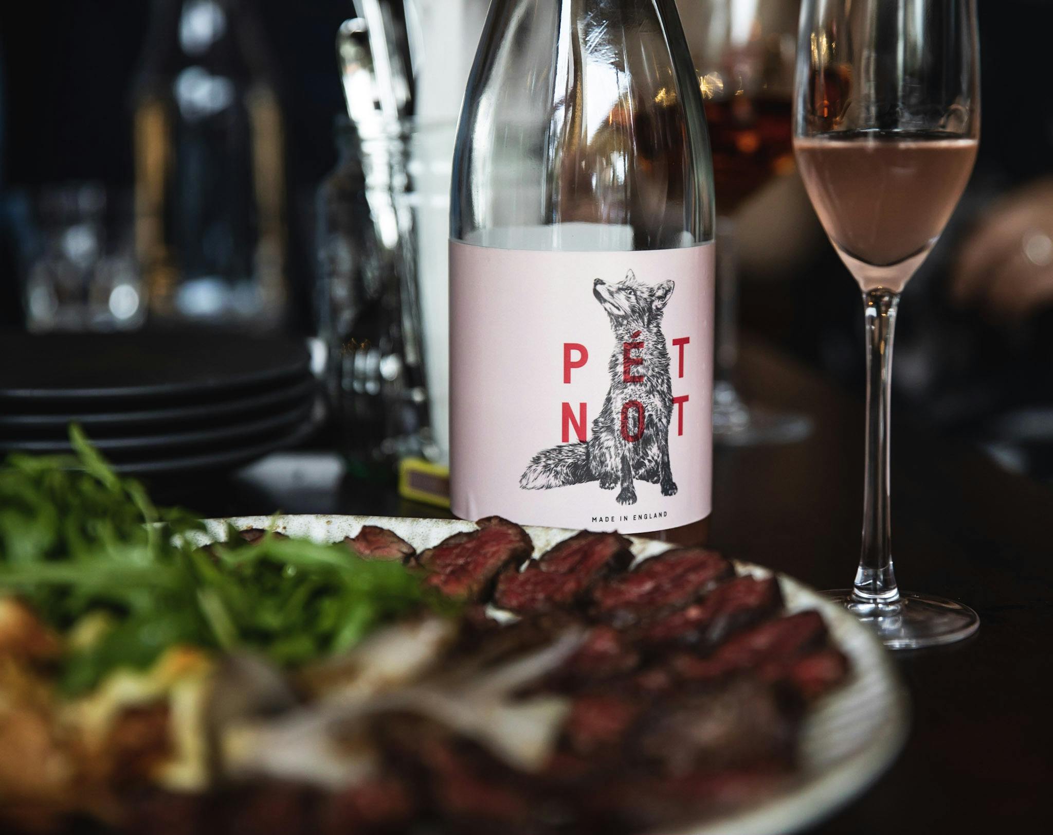 Stylish dining setup with gourmet steak and Pet Nat wine at Vagabond Paddington venue hire.