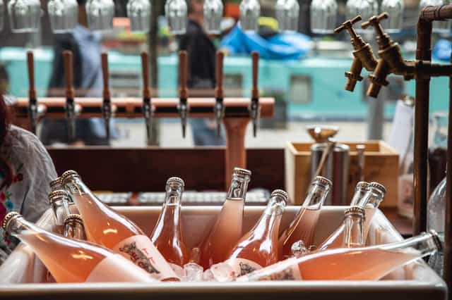 Stylish rosé beverage display in ice for summer outdoor events in Central Otago.