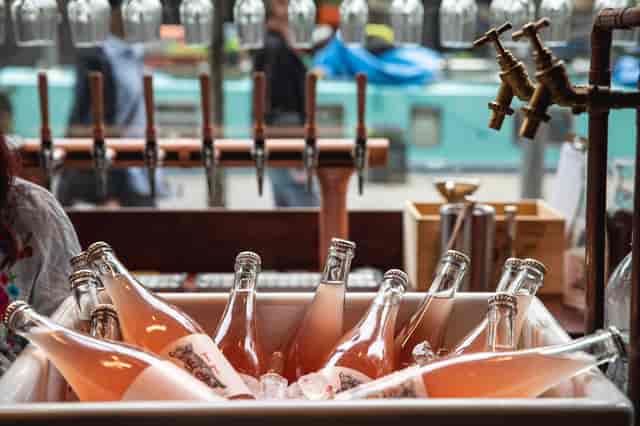 Stylish rosé beverage display in ice for summer outdoor events in Central Otago.