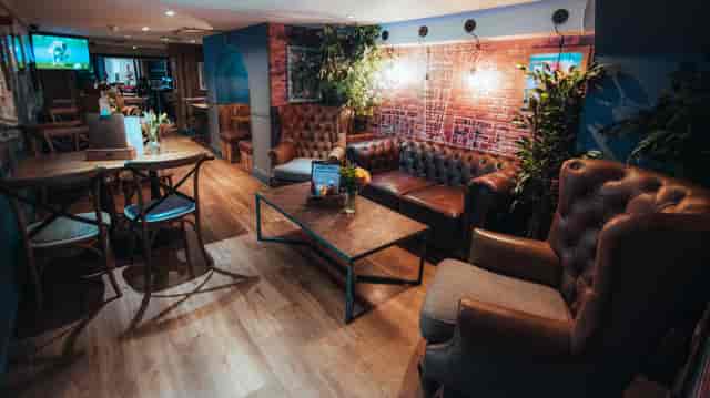 Cozy meeting space in St Christopher's Inn, ideal for gatherings and brainstorming sessions.