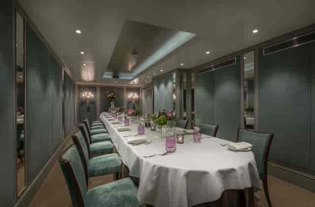 Cadogan Suite meeting space with elegant table, ideal for exclusive events and gatherings.