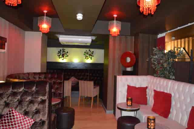 Stylish lounge bar with plush seating, ideal for networking events and gatherings.