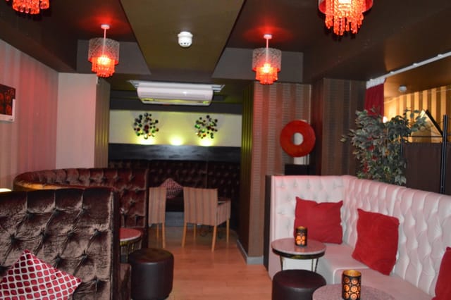 Stylish lounge bar with plush seating, ideal for networking events and gatherings.