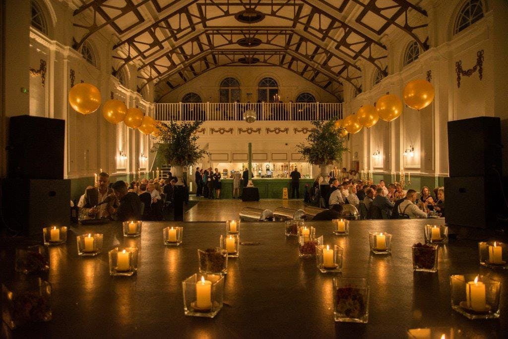 Main Hall at The Hammersmith Club, elegant candlelight, ideal for events and celebrations.