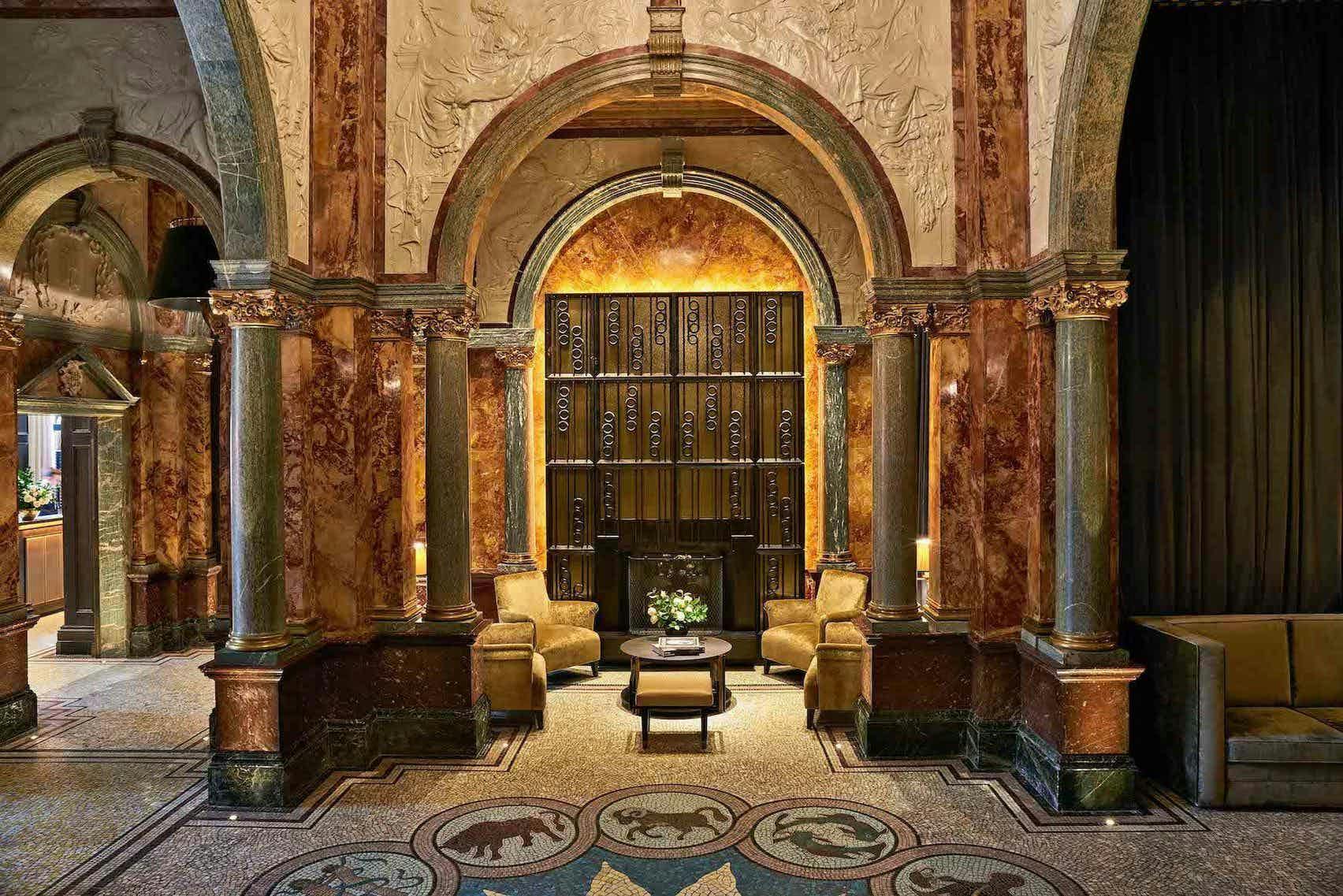 Sophisticated Kimpton Fitzroy London lobby with marble finishes, ideal for networking events.