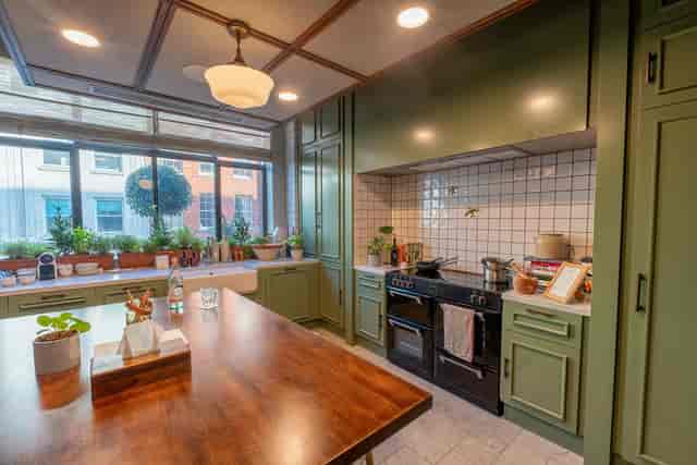 Kitchen table in Mortimer House, modern design for culinary events and gatherings.