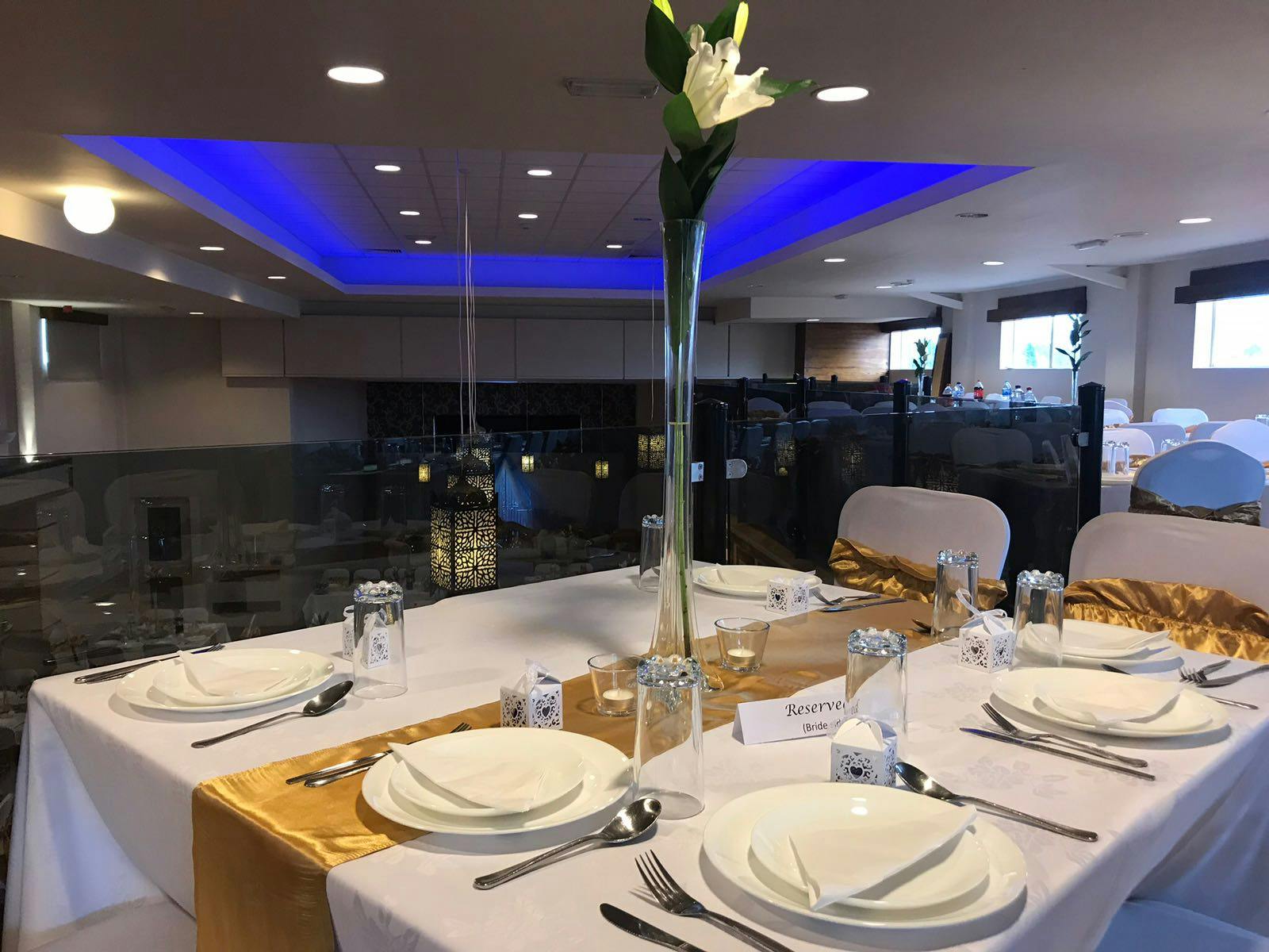 Elegant dining table with floral centerpiece in Avantay banqueting suite for corporate events.