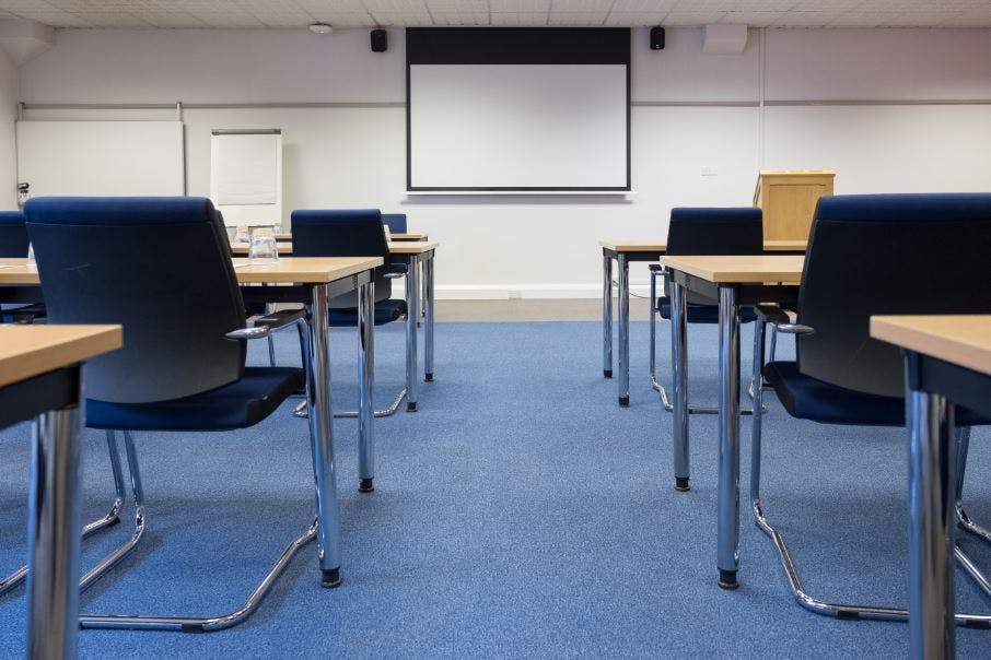 Medium training room setup for corporate workshops at Burleigh Court Conference Centre.