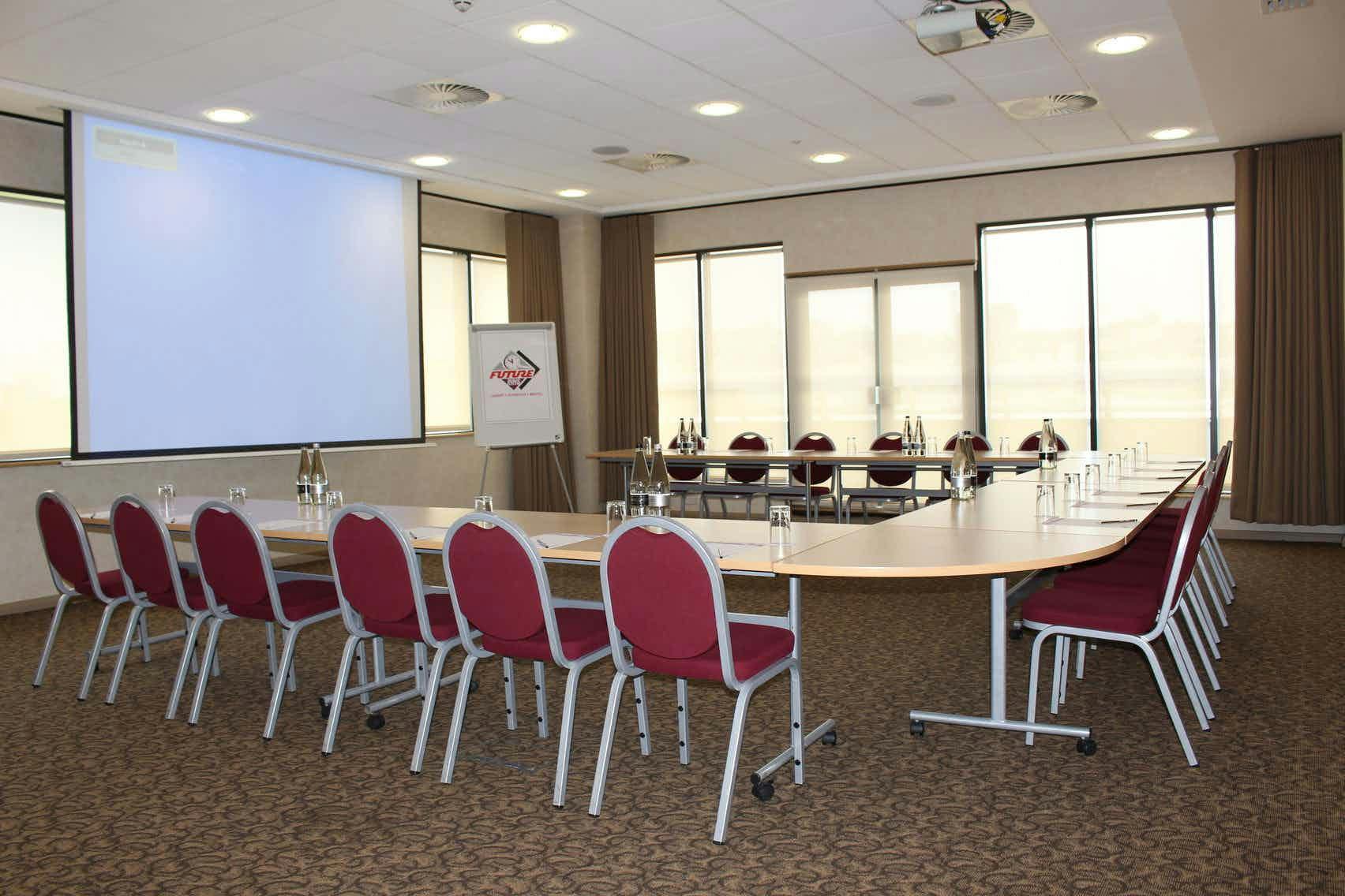 Meeting room at Future Inn Bristol with natural light, ideal for professional events.