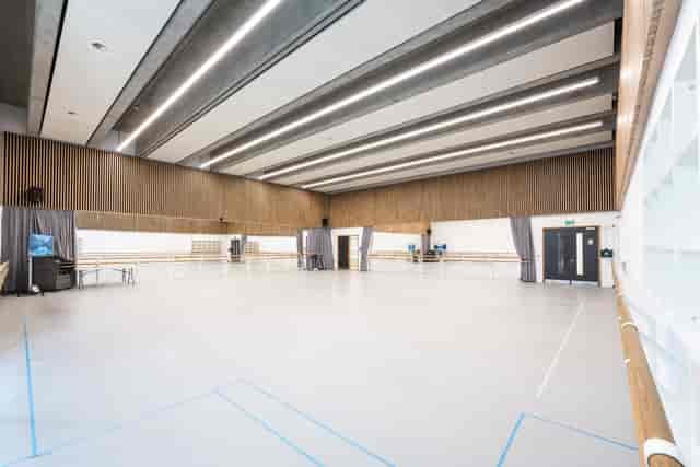 Spacious rehearsal studio with mirrors, ideal for dance classes and workshops in London.