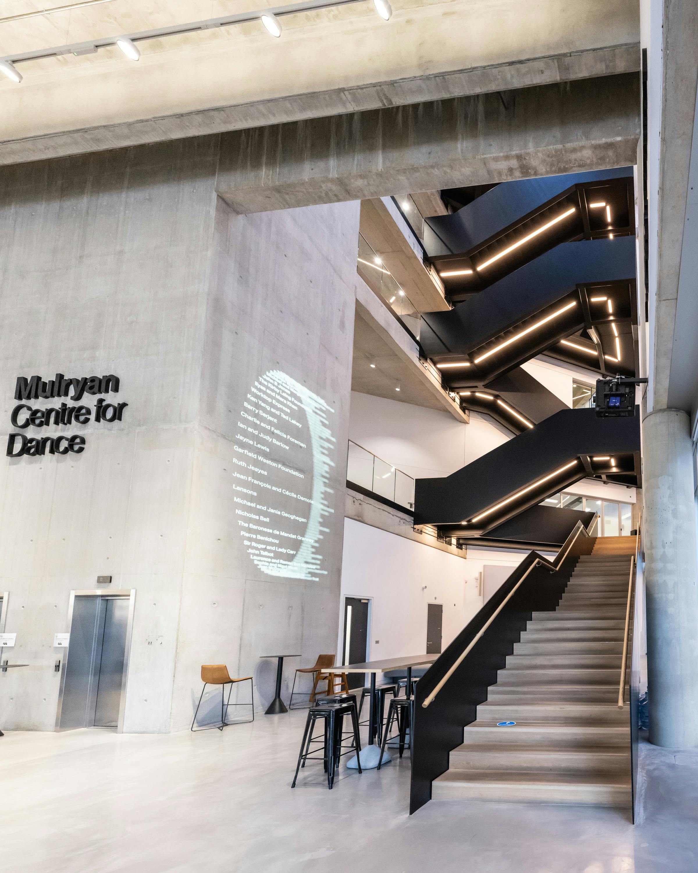 Dorfman Foyer at English National Ballet, modern venue with sleek staircase for events.