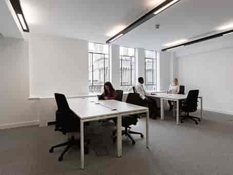 Modern meeting room with large windows for collaboration and creativity at Spaces City Road.