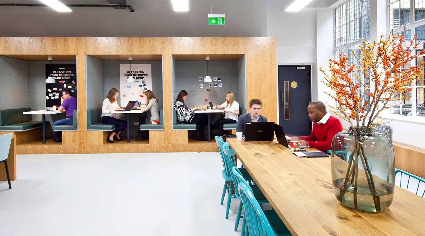 Modern co-working space with cozy booths for events and workshops at Spaces Hammersmith.