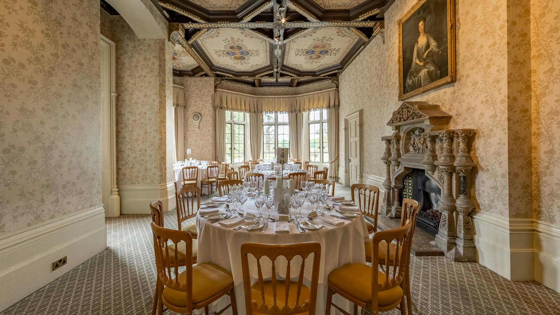 Elegant dining room at The Elvetham, Hampshire, perfect for upscale events and gatherings.