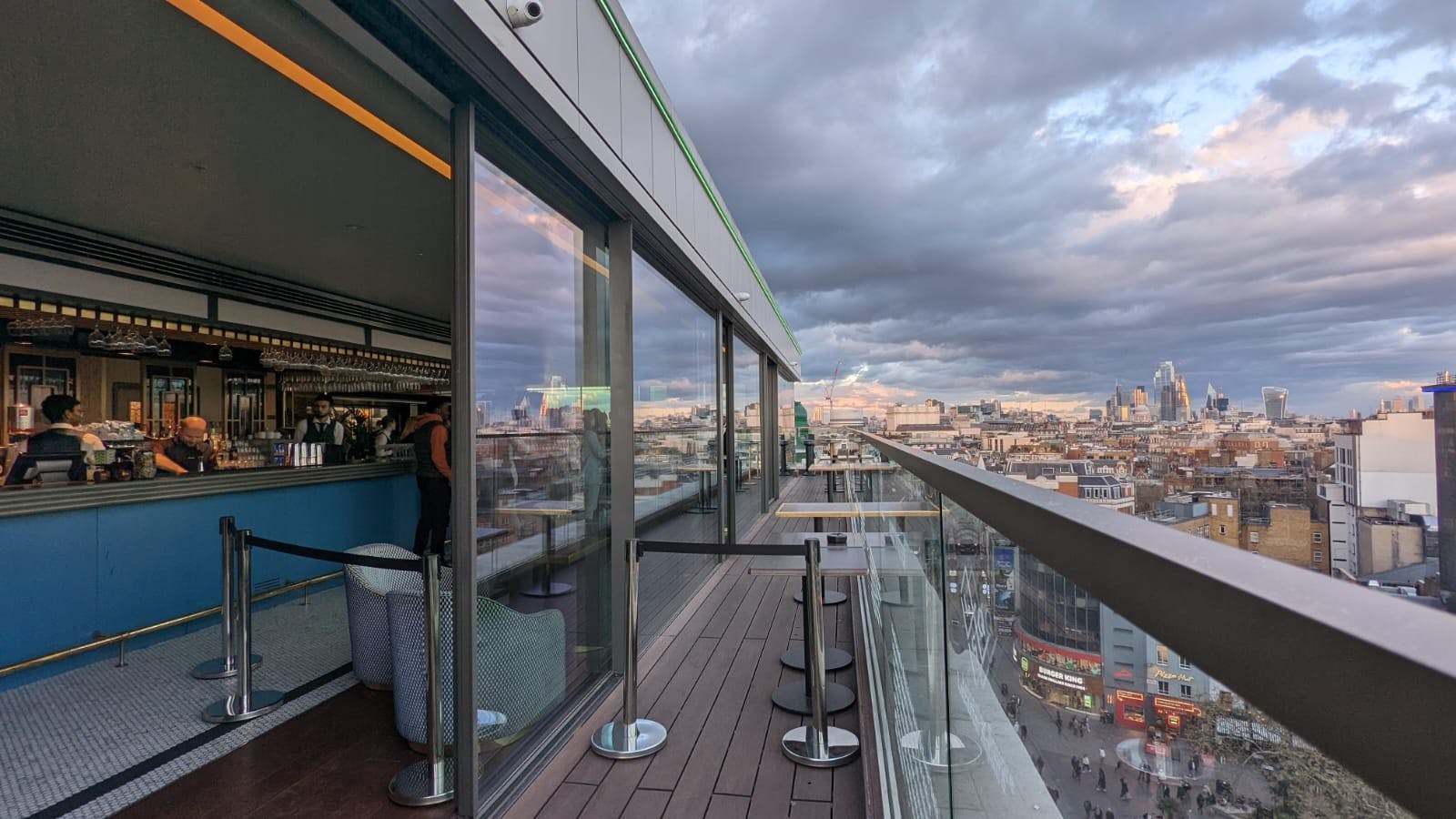 Stylish LSQRooftop venue with sleek bar and panoramic city views for upscale events.