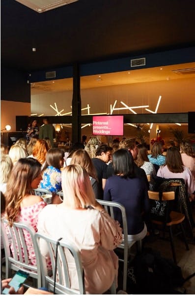 Stylish wedding event at Bar + Kitchen, EartH with modern decor and Pinterest branding.