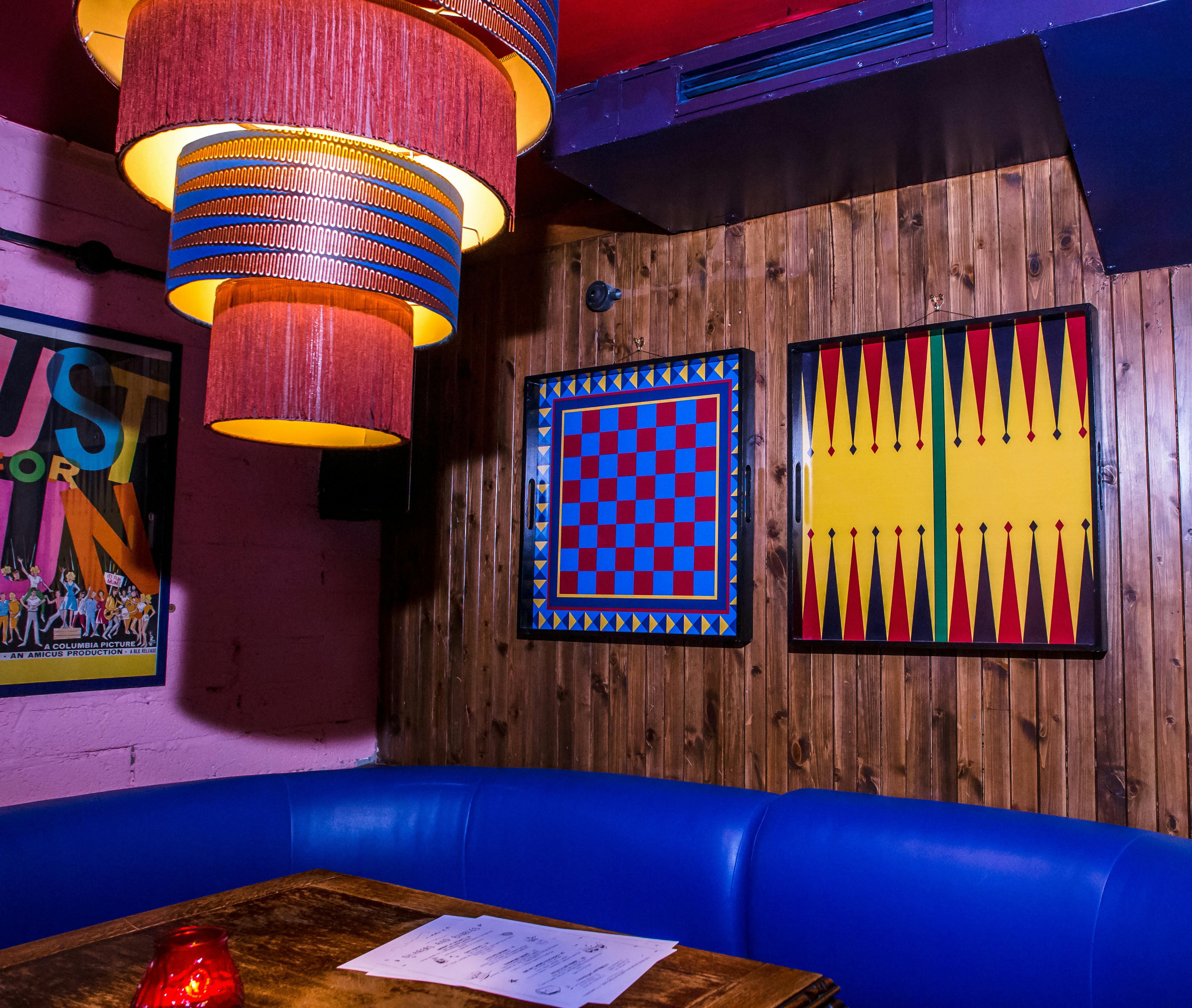Vibrant event space at Flatmates Den, perfect for gatherings and brainstorming sessions.