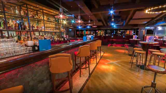 Industrial-chic breakout space at Be At One Birmingham, perfect for corporate happy hours.