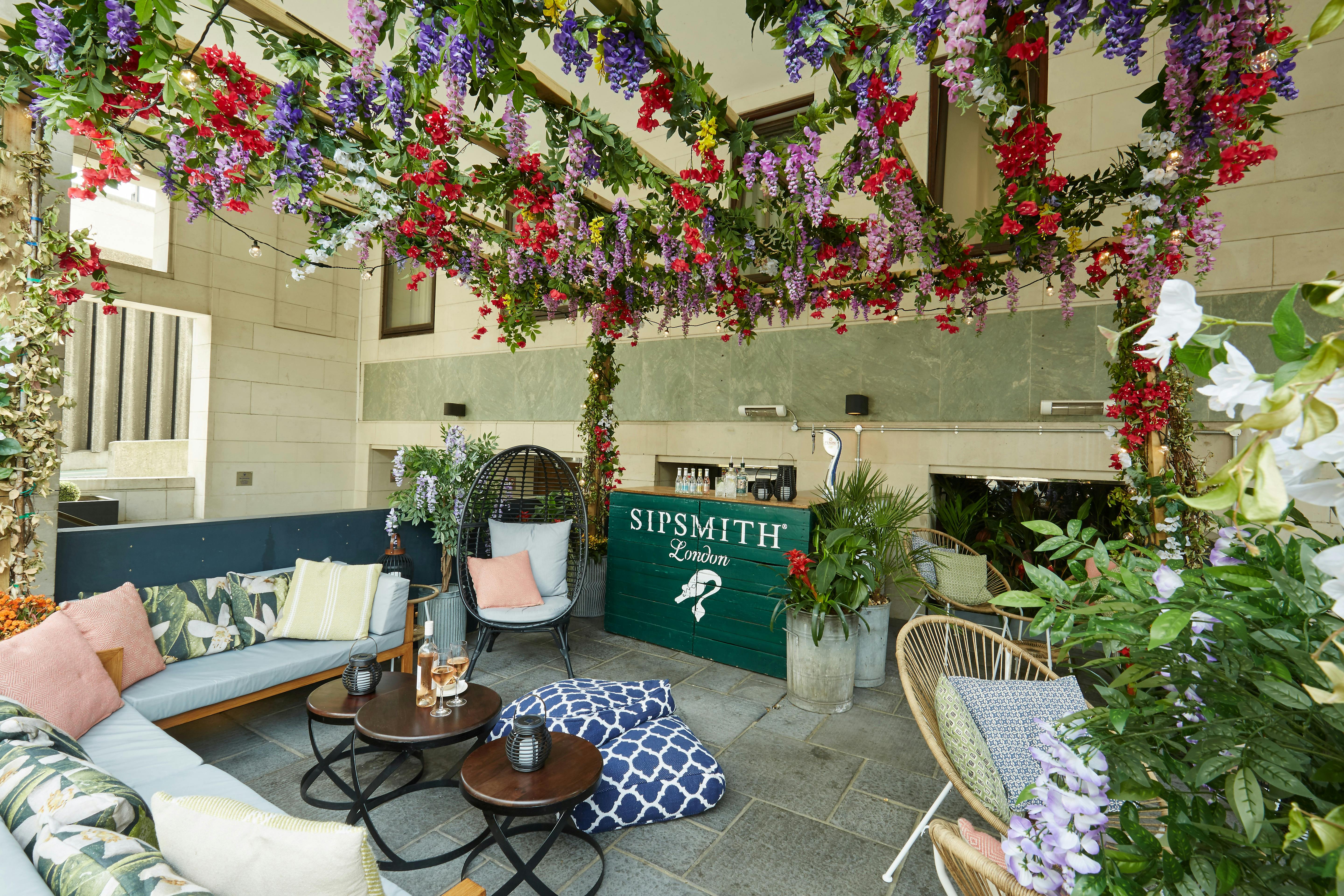 Summer Terrace at Brasserie Blanc Southbank, vibrant floral decor for events and gatherings.