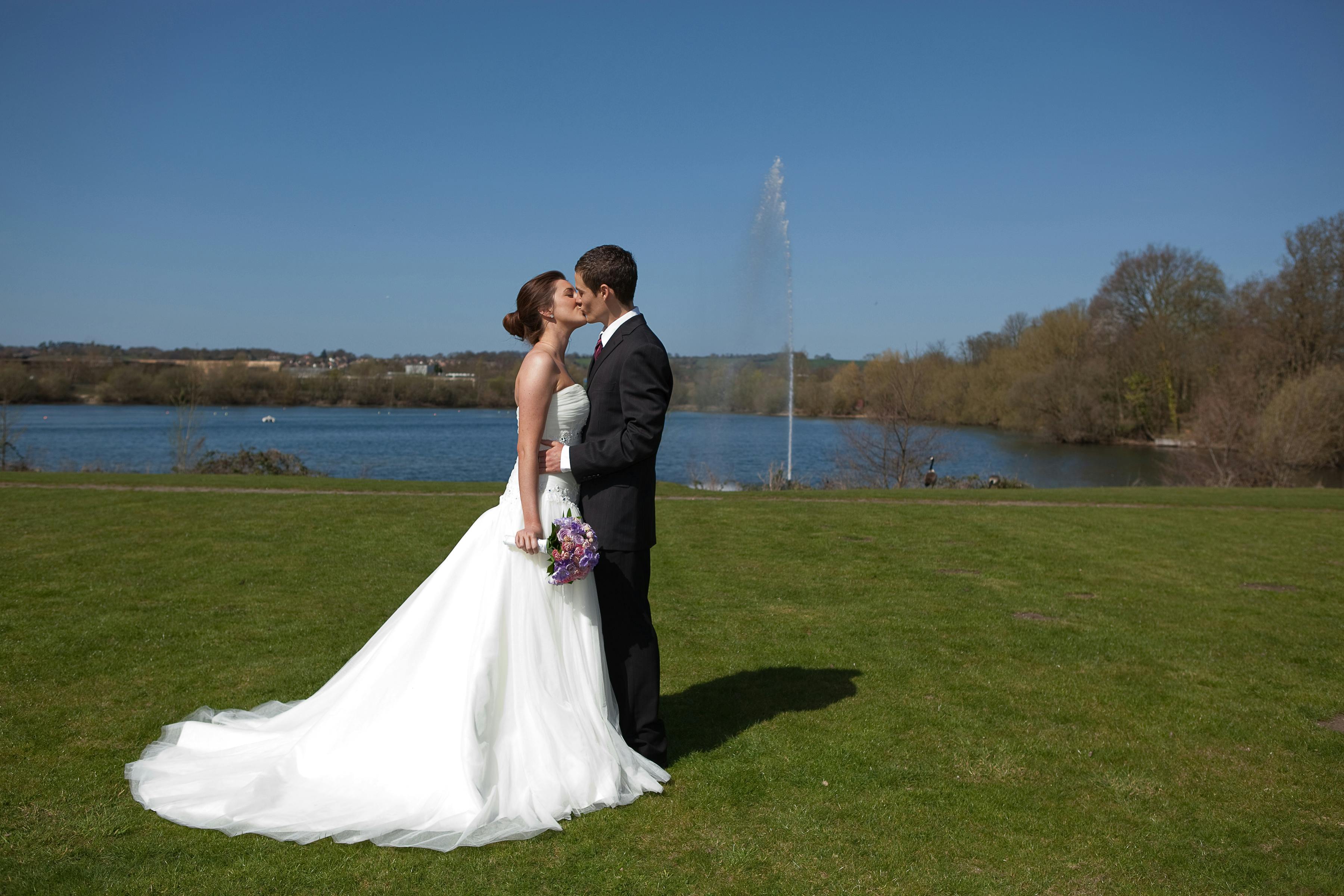 Outdoor wedding at Lakeside 3, Crowne Plaza Marlow, with serene lake backdrop.