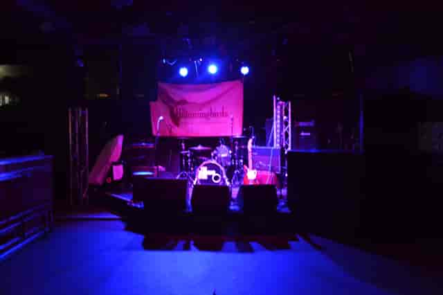 Live music venue at The Zanzibar Club with stage lighting for concerts and events.