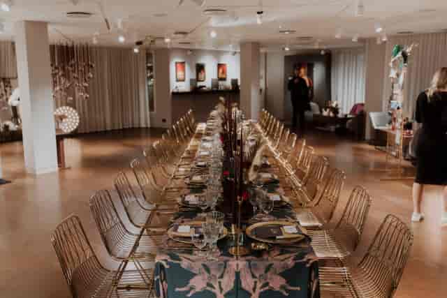 Elegant dining setup with floral centerpieces for upscale events at The Lounge, 12 Hay Hill.