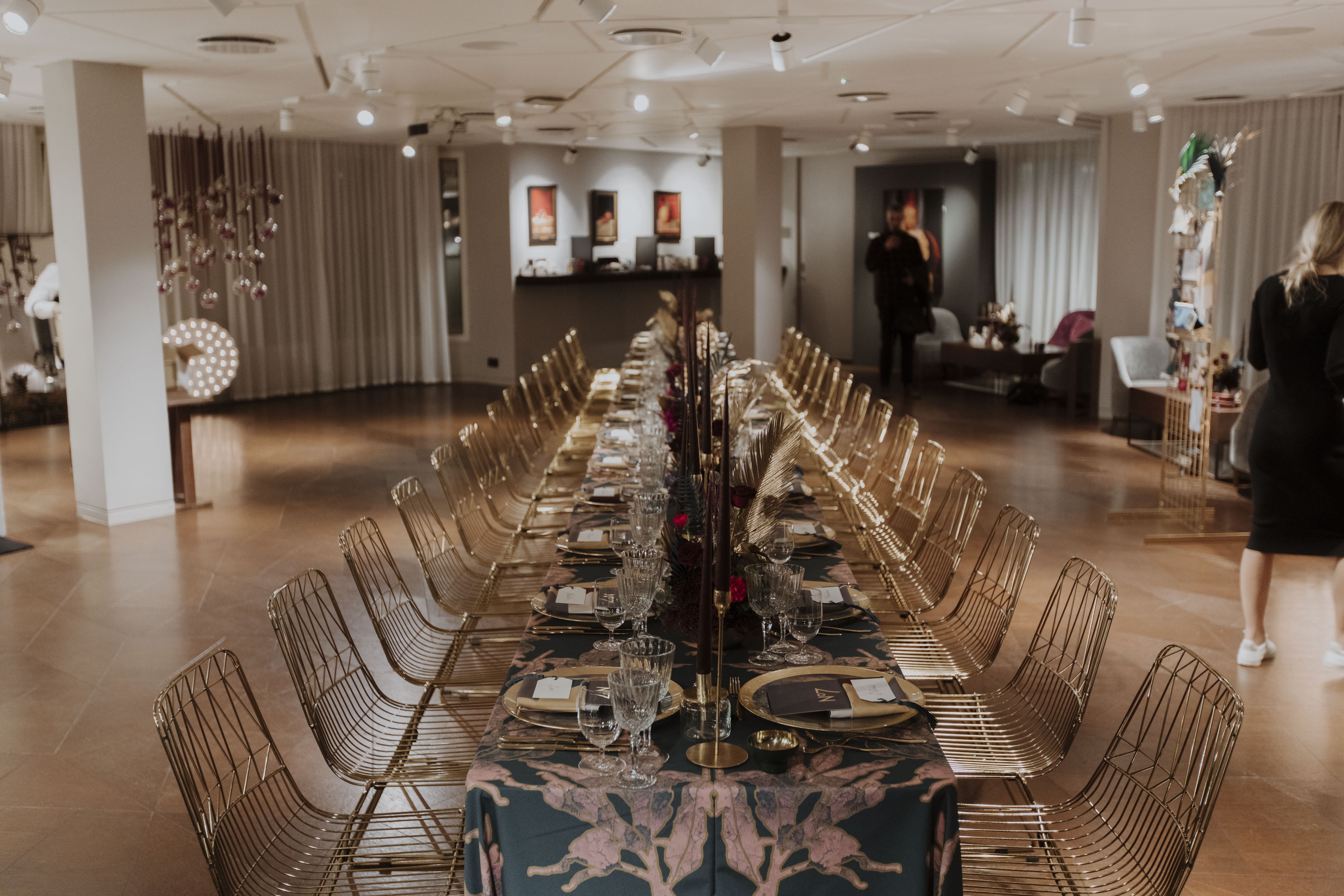 Elegant dining setup with floral centerpieces for upscale events at The Lounge, 12 Hay Hill. - Banner