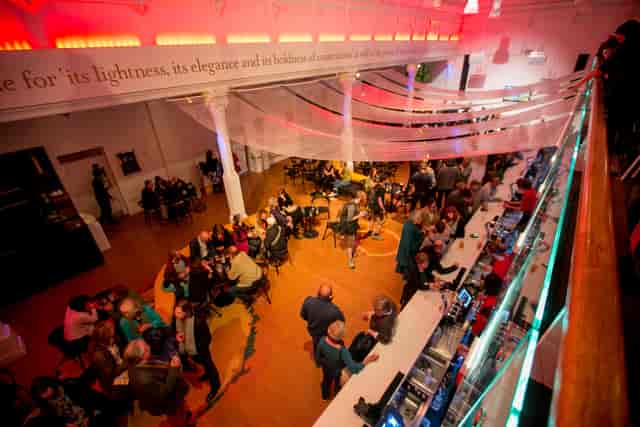 Brighton Dome Foyer Bar: vibrant networking space with elegant drapery for events.