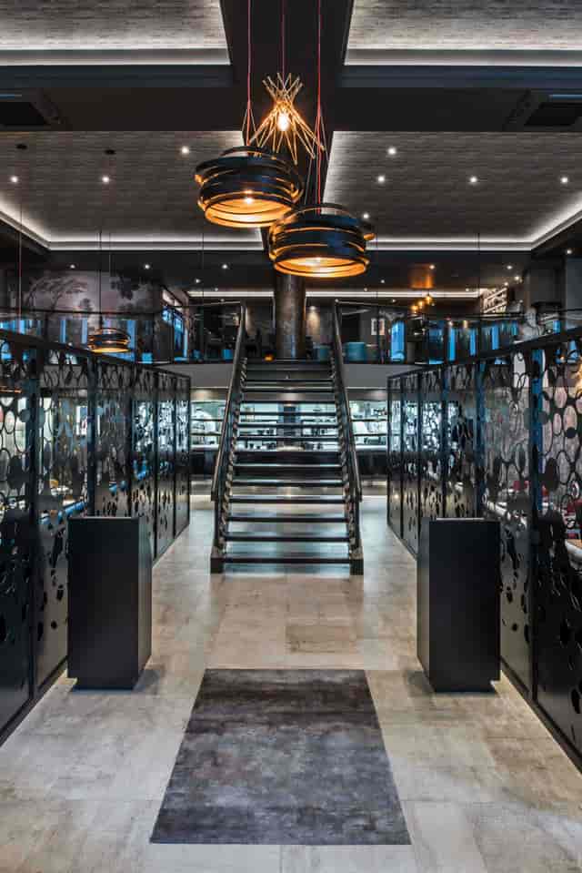Modern GRILL venue on M Threadneedle Street with striking staircase, ideal for upscale events.