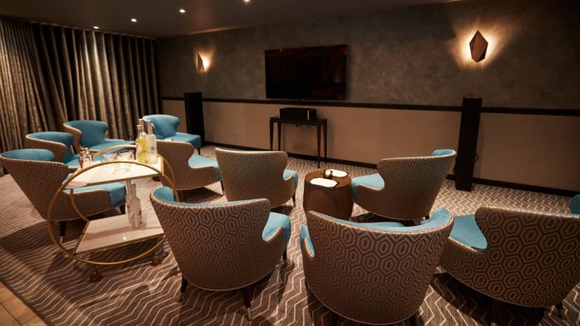 Stylish meeting space at THE DEN, perfect for executive meetings and brainstorming sessions.