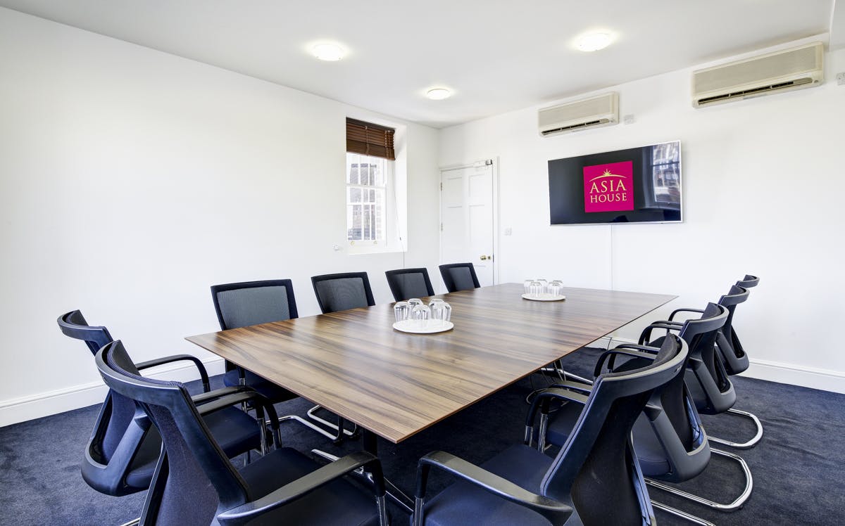 Modern Boardroom 2 in Asia House with sleek table, ideal for professional meetings.