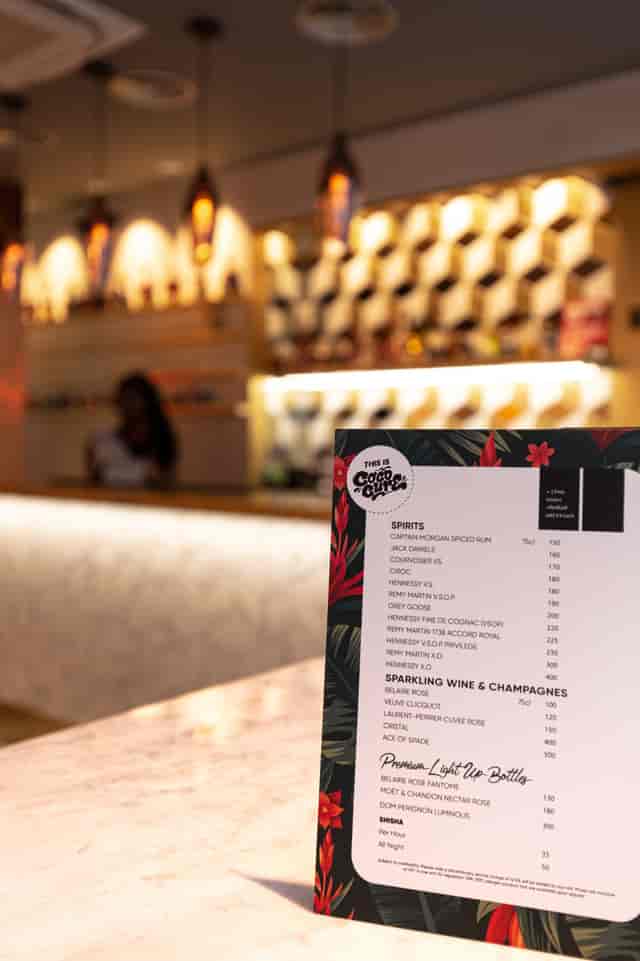 Vibrant cocktail menu in stylish bar for events and gatherings at Cococure.