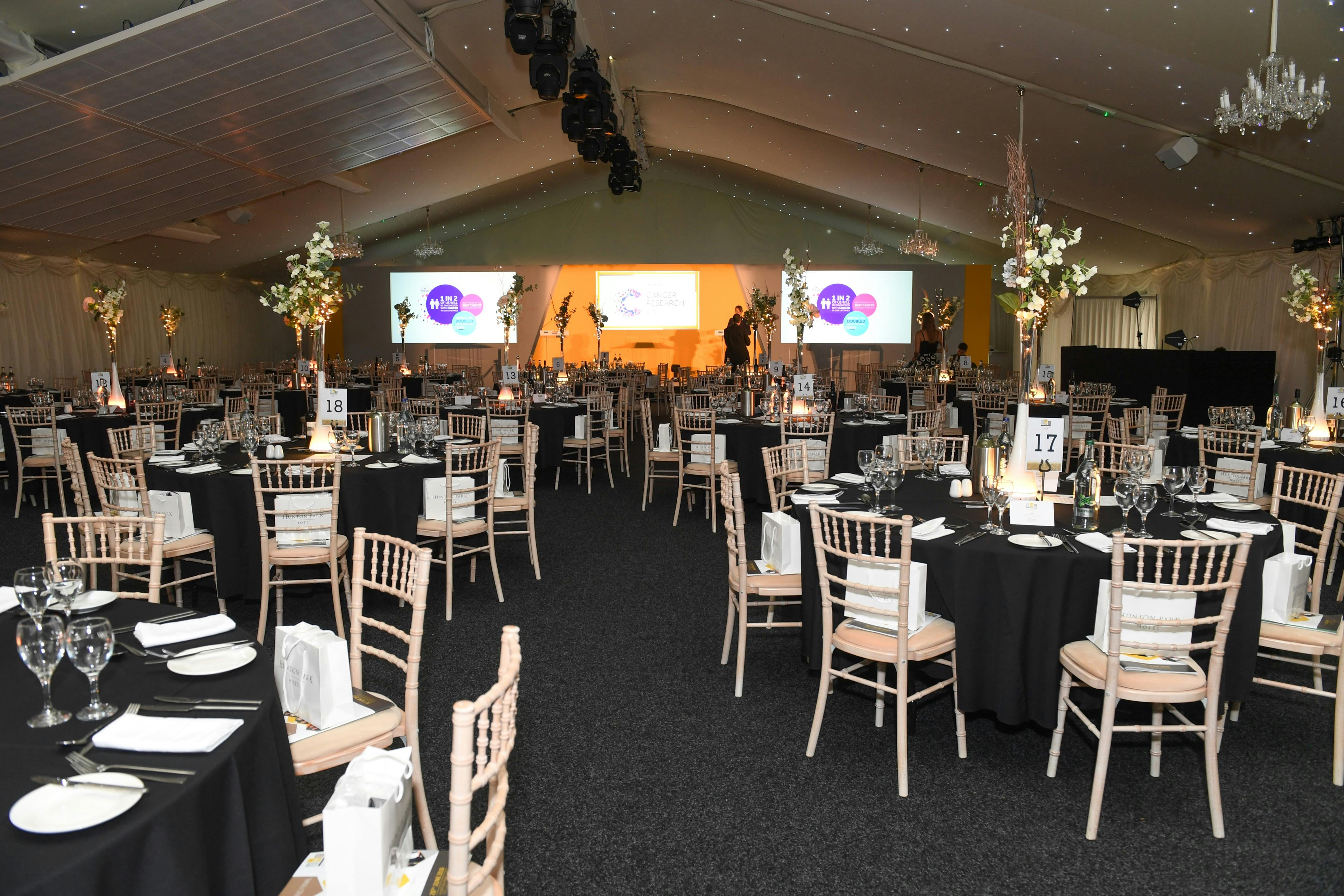 Garden Marquee at Hunton Park Hotel, elegant tables for corporate events and galas.