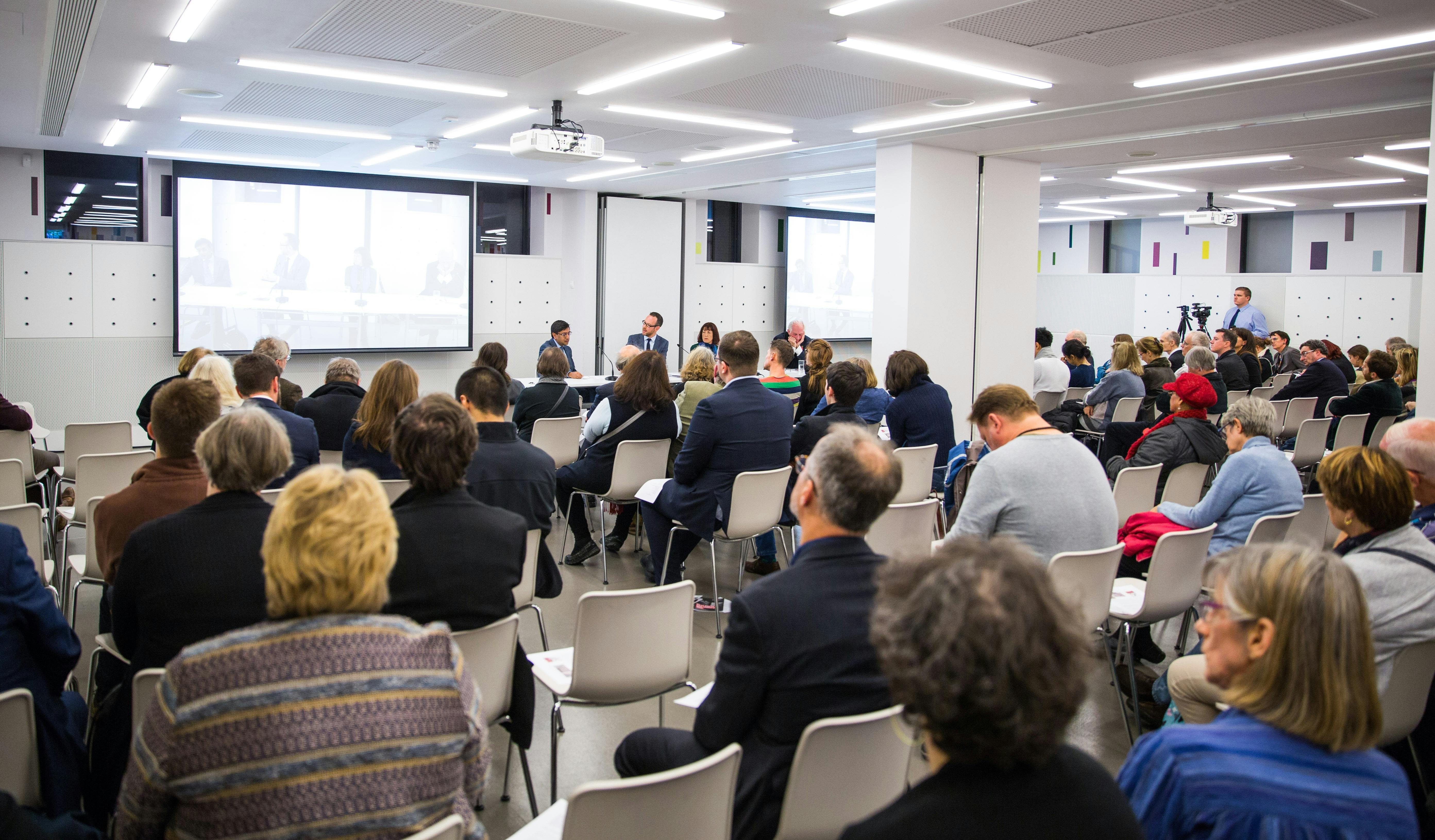 Panel discussion at Foyle Centre, National Army Museum; modern setup for networking event.