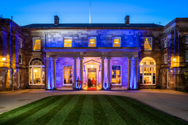 Hillsborough Castle venue with blue lighting, ideal for weddings and corporate events.