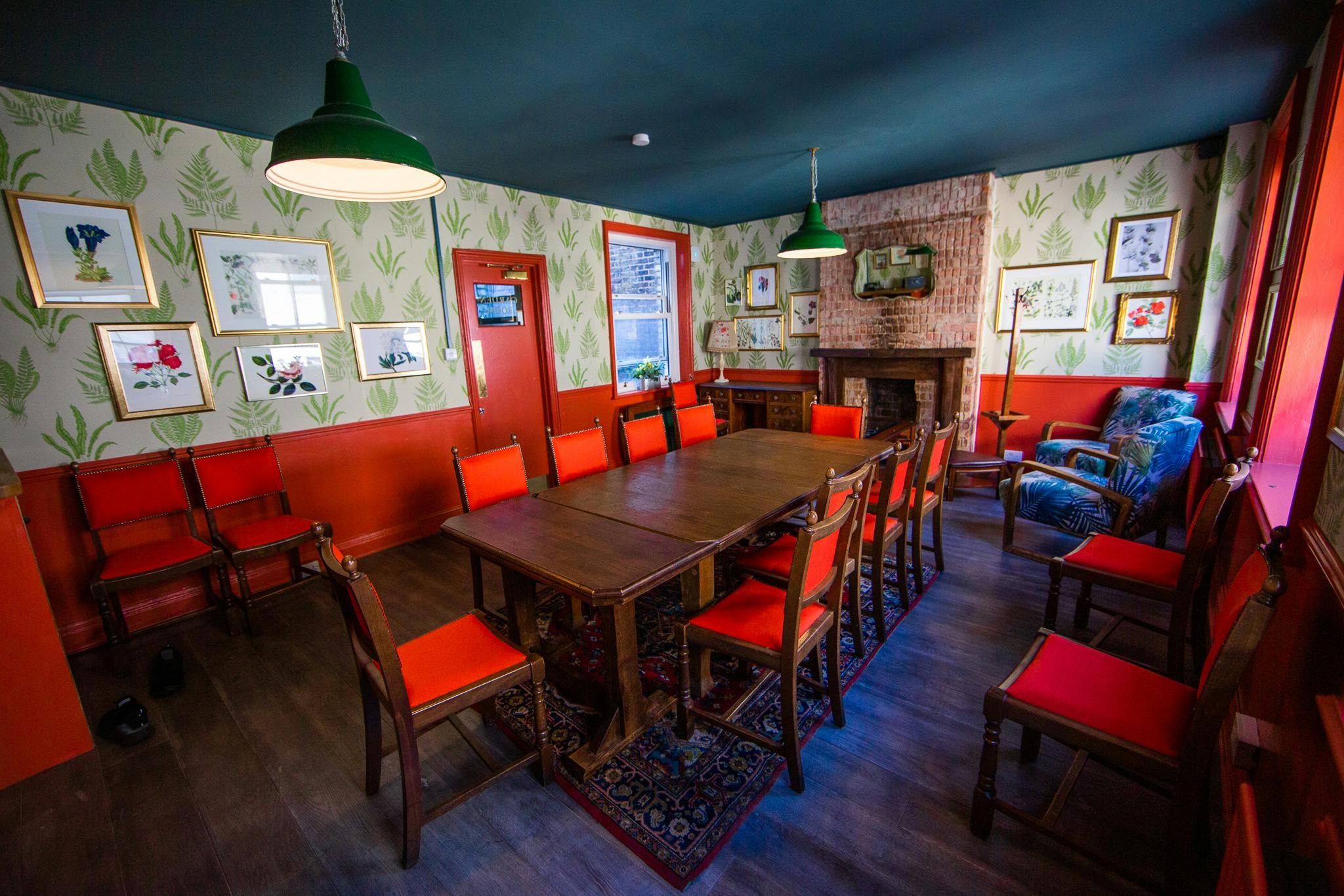 Cozy meeting room at Bow Street Tavern, perfect for workshops and gatherings.