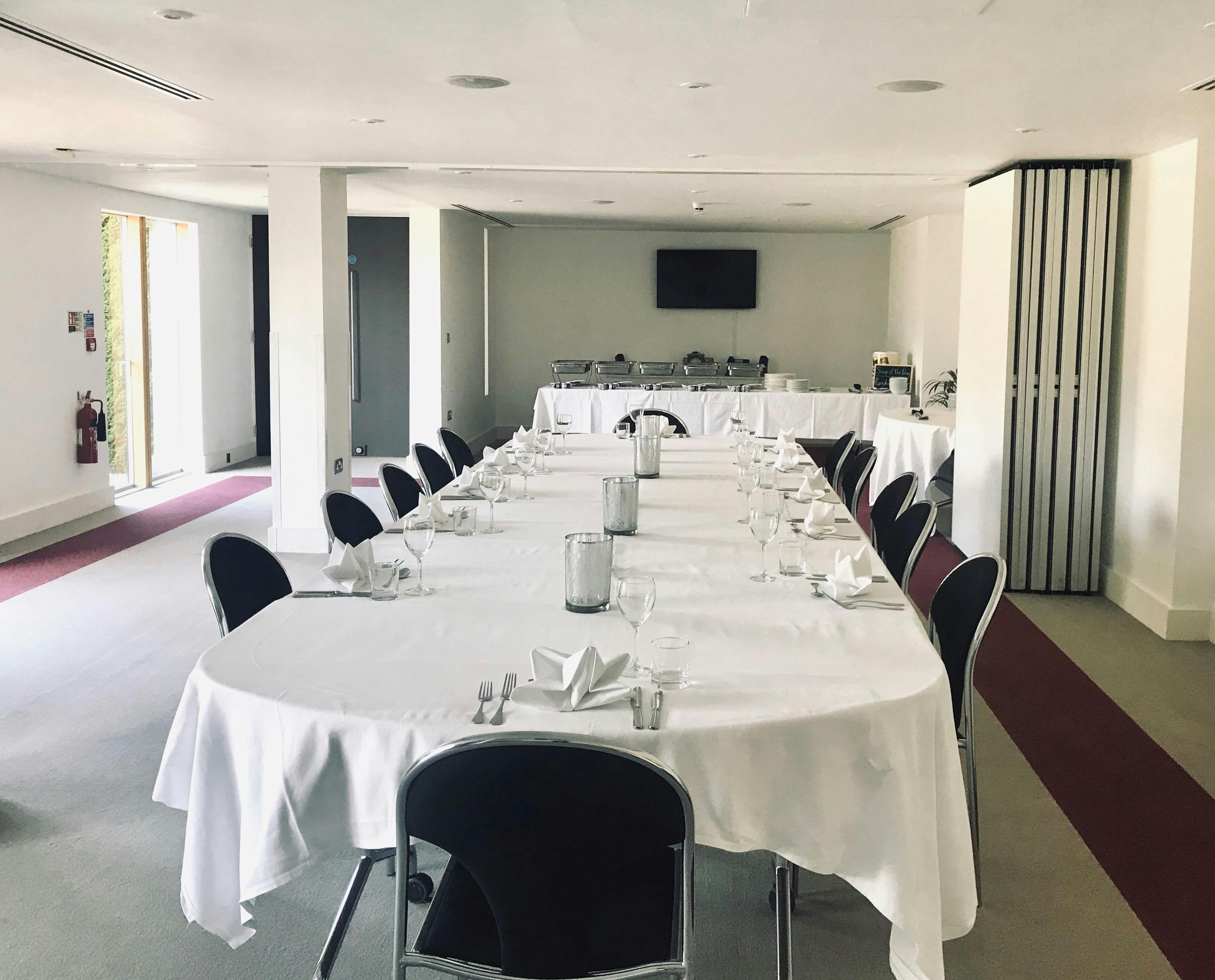 Thorpe Suite at Lifehouse Spa: elegant meeting space for conferences with bright natural light.