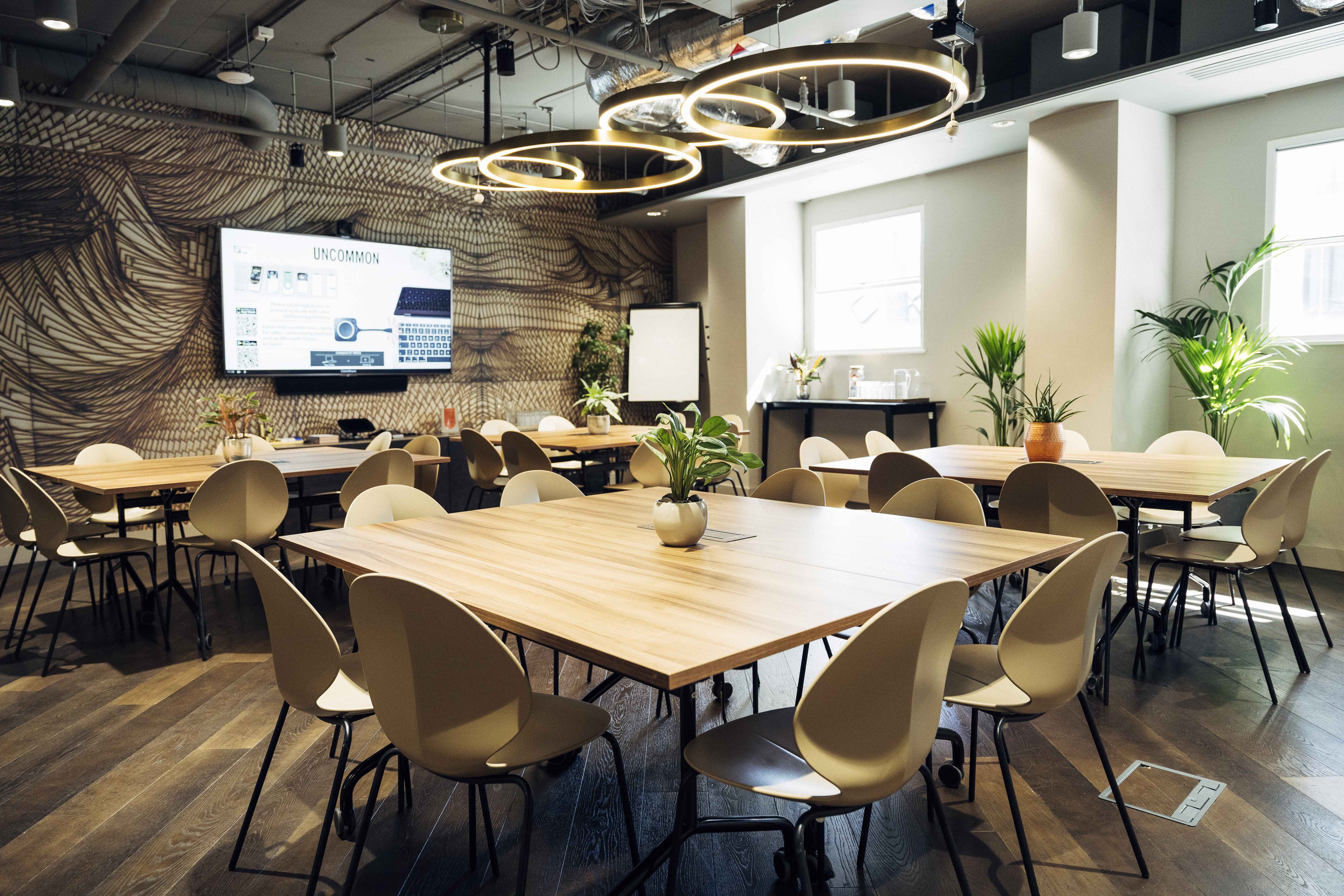 Modern meeting room with flexible layout for workshops and brainstorming at Uncommon Liverpool.