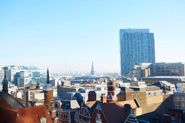 Meeting Room 4 at Uncommon Liverpool Street with a panoramic cityscape, perfect for events.