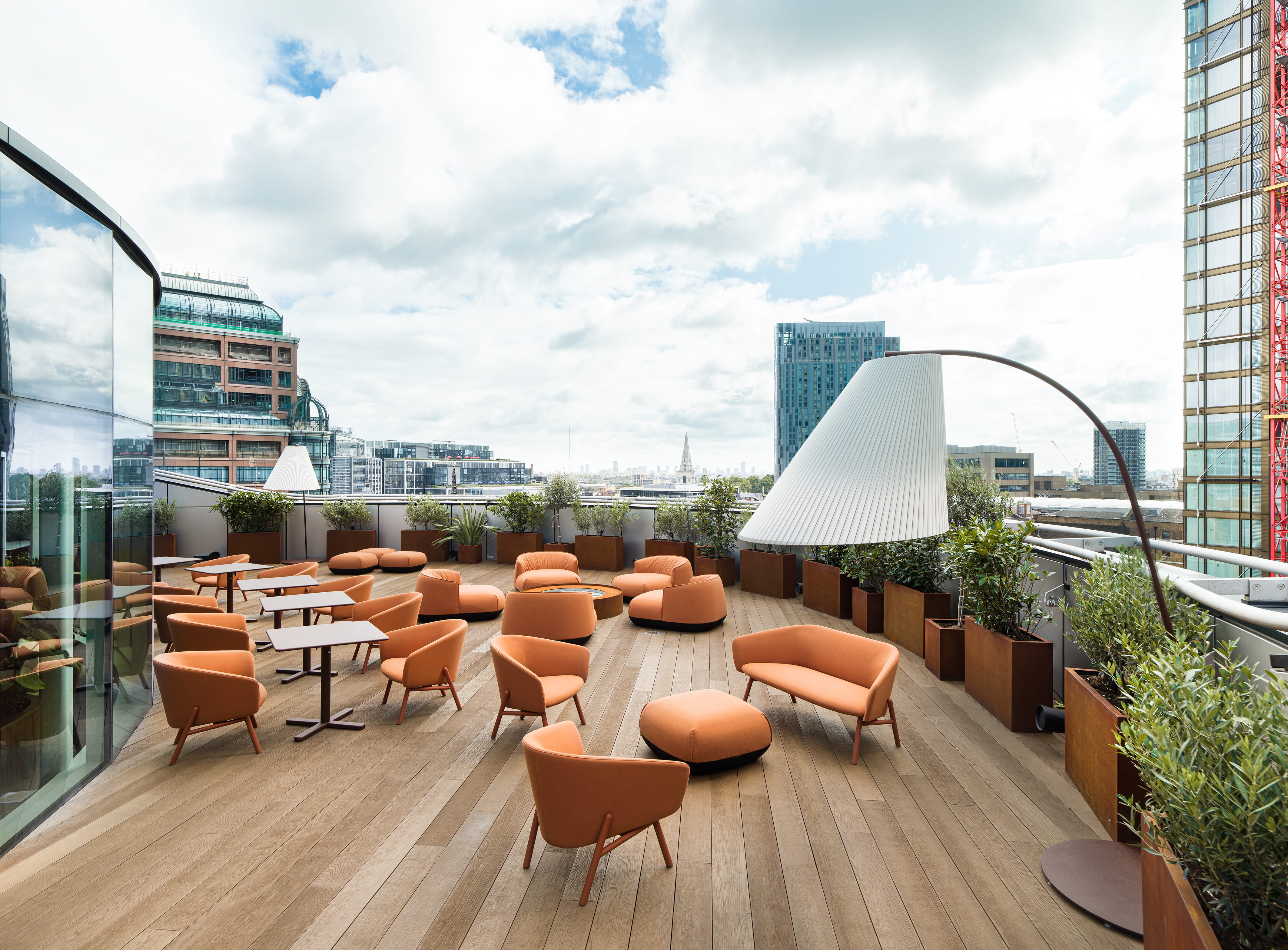 Modern rooftop terrace at Uncommon Liverpool Street with stylish seating for events.