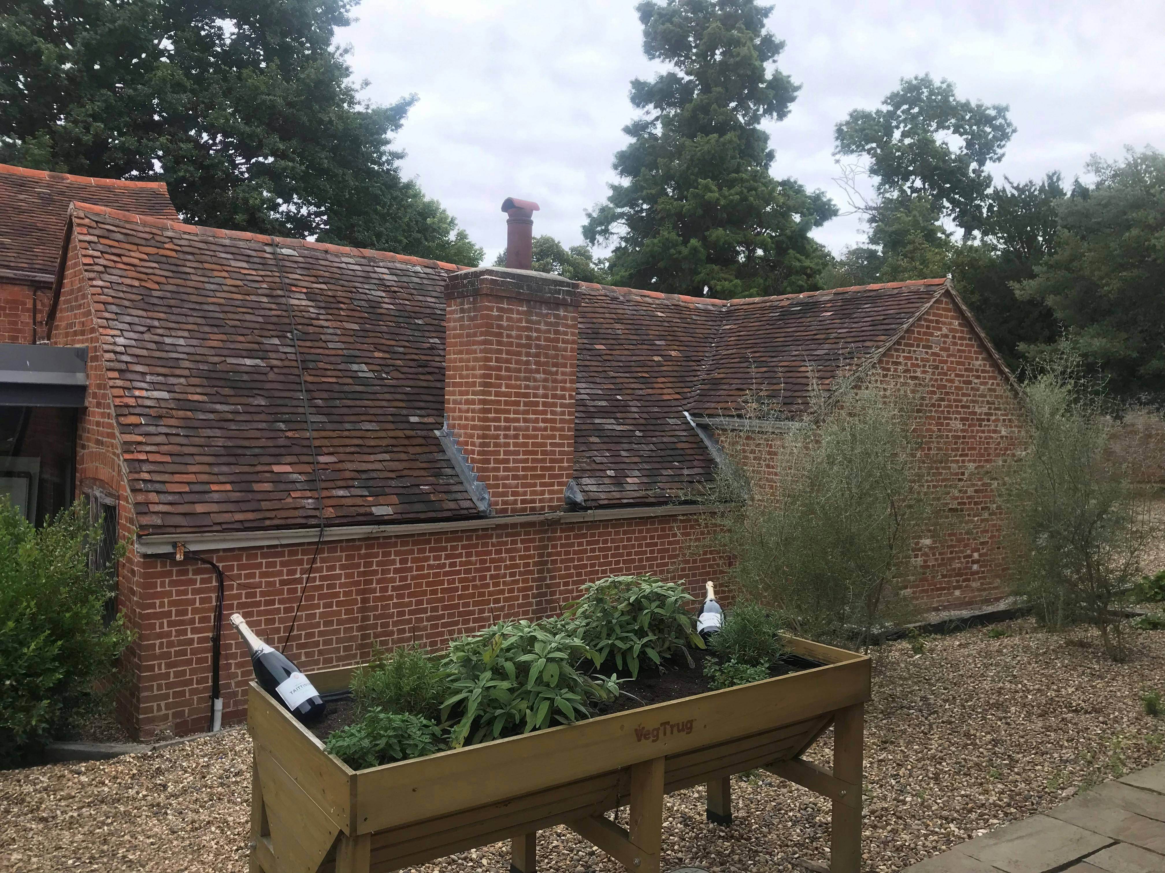 Cottage Boardroom at Lifehouse Spa: rustic outdoor venue for retreats and receptions.