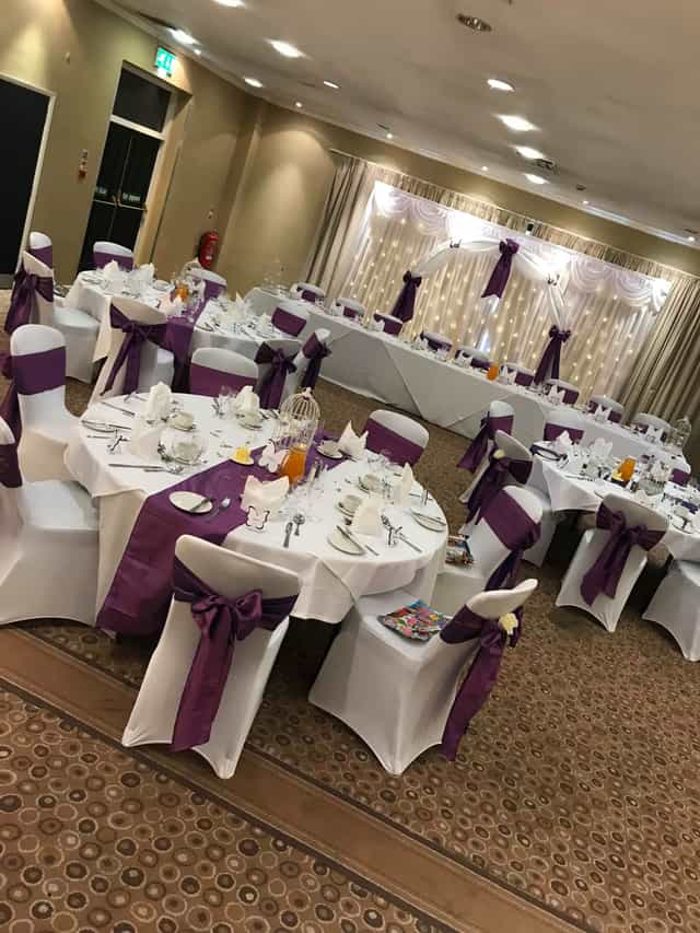 William Duesbury at a sophisticated banquet with elegant purple accents, ideal for weddings.