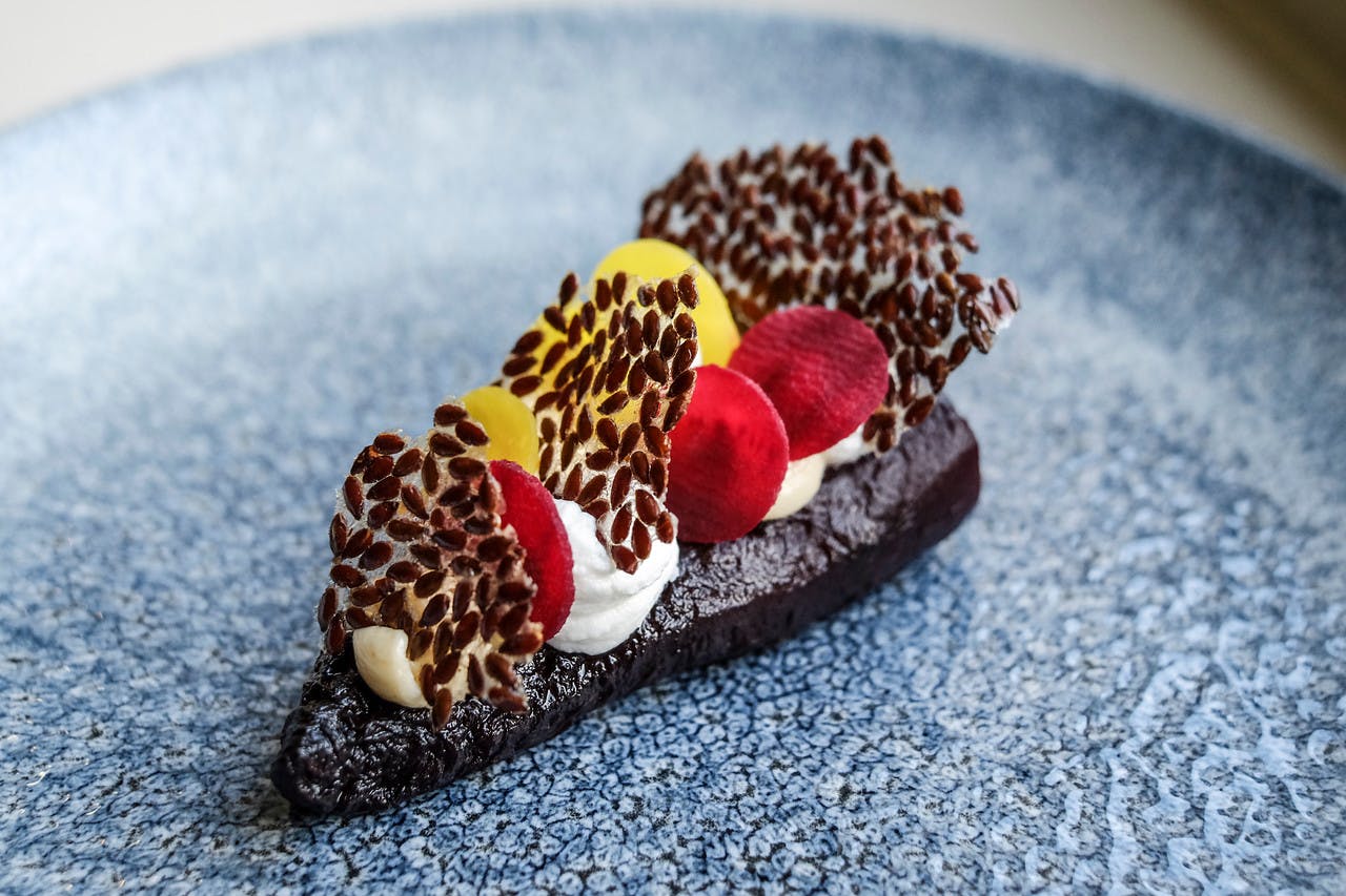 Vibrant dessert in Lord's Cricket Ground home dressing room for upscale events.