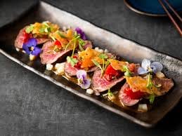 Elegant gourmet dish at The Rambutan Room for upscale corporate events and galas.